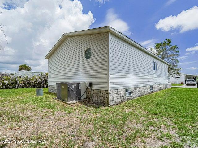 818 Thrush Circle, Barefoot Bay, FL, 32976 photo 4