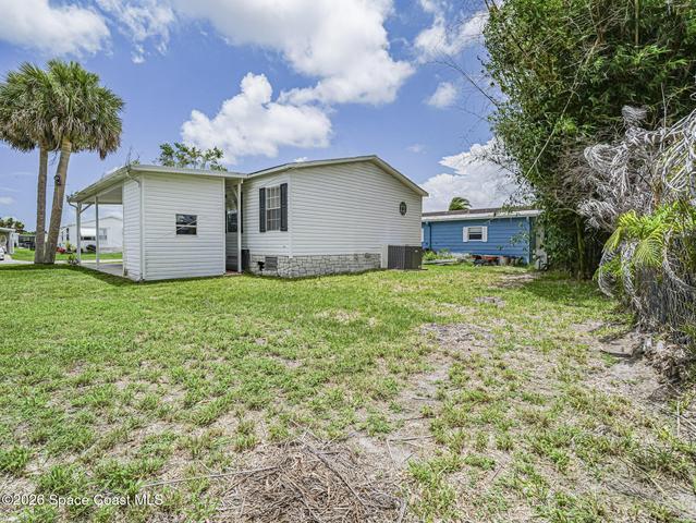 818 Thrush Circle, Barefoot Bay, FL, 32976 photo 5