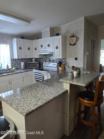 858 Pecan Circle, Barefoot Bay, FL, 32976 photo 12