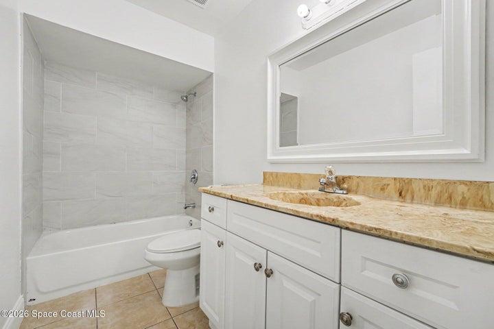Tile Soaking Tub with Shower and Spacious Vanity