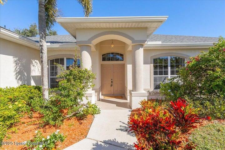 Elegant entry way , your home on one half acre