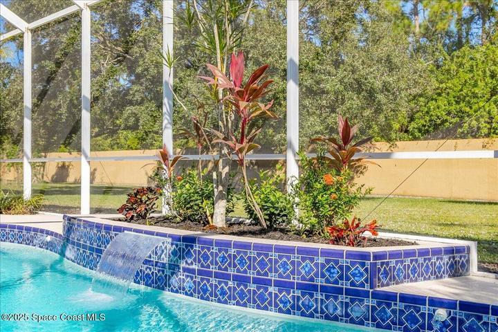 Pool has waterfall feature