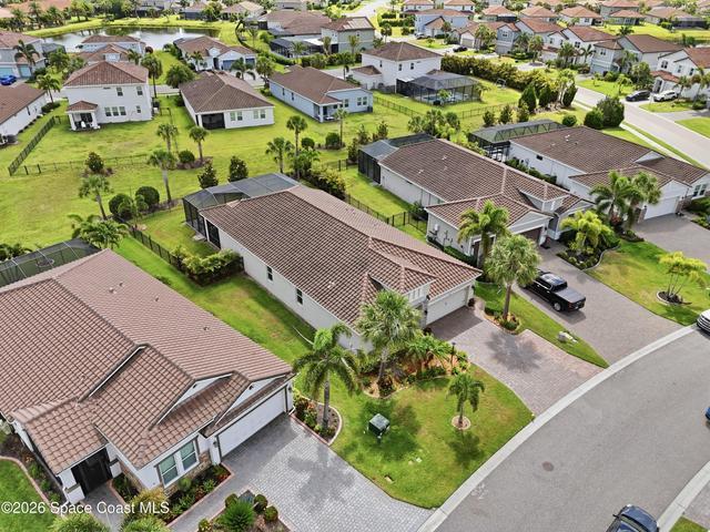Aerial view showcasing the home’s position within a beautiful community