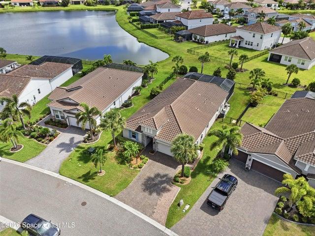 Aerial view showcasing the home’s position within a beautiful community
