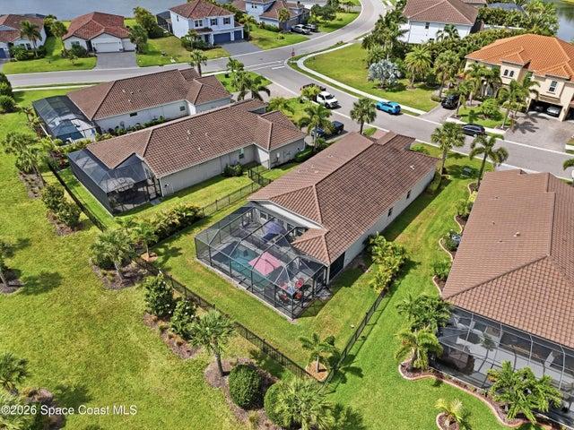 Aerial view showcasing the home’s position within a beautiful community