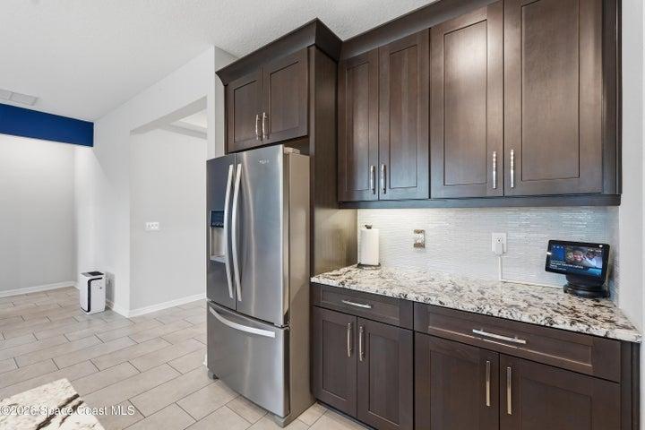 Well-appointed kitchen with ample cabinetry and counter space