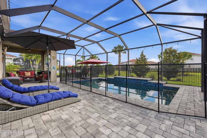 Refreshing pool with space for lounging and gatherings