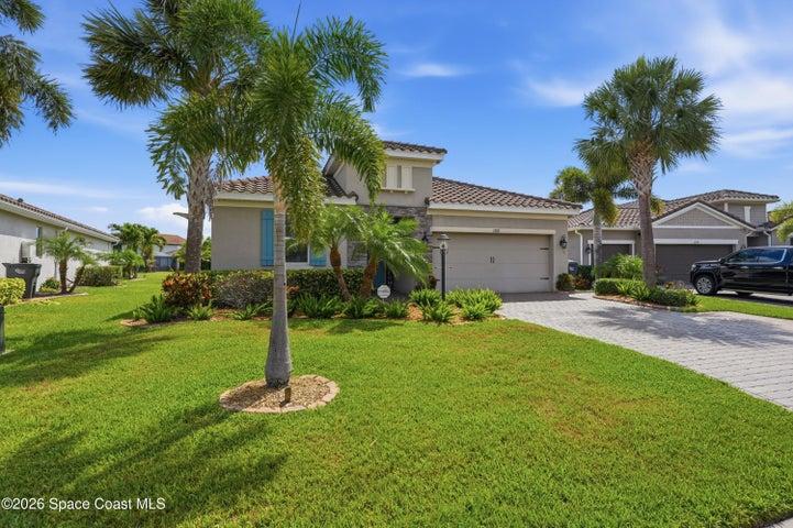 Stunning front elevation with beautiful curb appeal and manicured landscaping