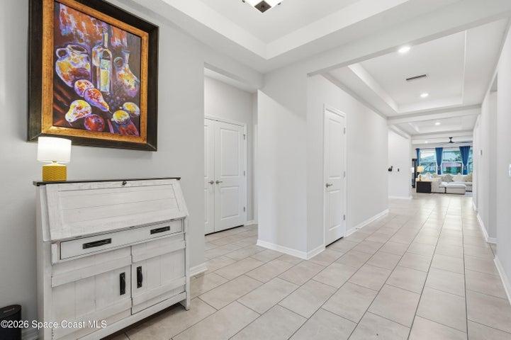 Welcoming foyer entry opening into a bright and spacious living area