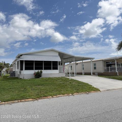 334 Macadamia Drive, Barefoot Bay, FL, 32976 photo 2