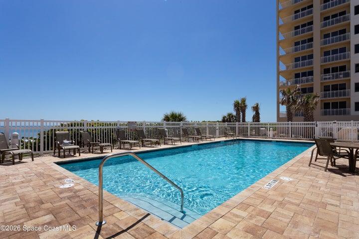 Heated community pool with ocean views.