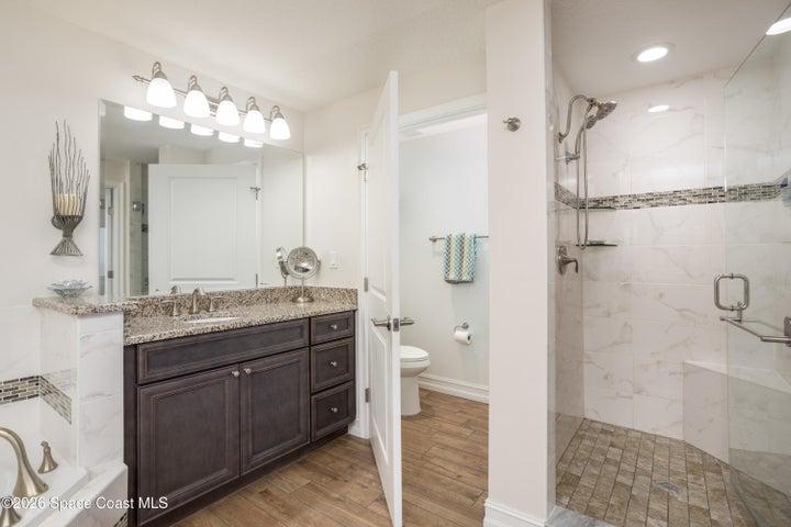 Primary bath featuring double sinks, jetted tub and separate shower.