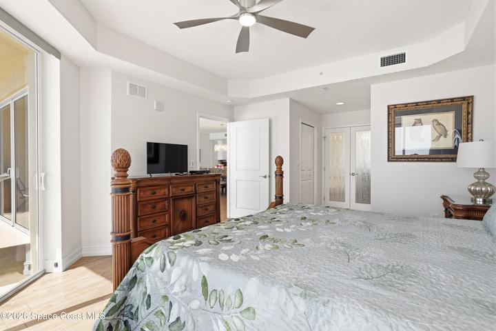 Tray ceilings in primary suite and foyer. Upgraded ceiling fans throughout this stunning condo.