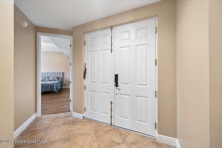 Dual front doors for easy entry and access to your spacious foyer.