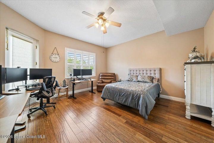 Bedroom #2, also huge with access to the exterior is also light and bright with a walk in closet with wooden closet system and Ensuite bath.