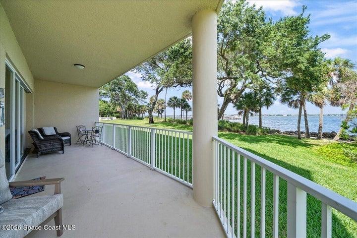 The deep porch wraps around the entire great room to the primary bedroom making it the perfect extension of your living area, providing a peaceful retreat to the river.