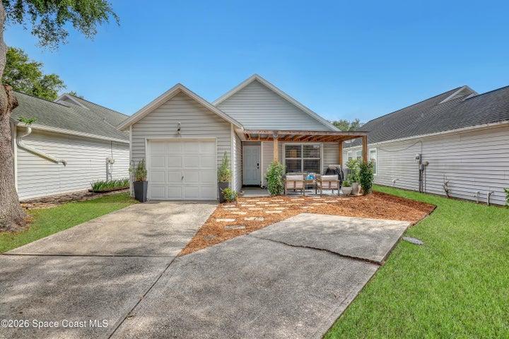 In back are 2 driveways for parking with a covered patio