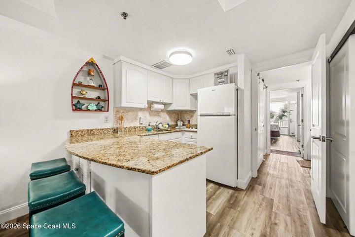 kitchenette with eat at bar