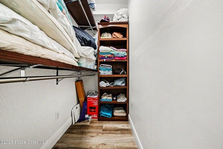 walk-in closet one of the three closets in the bedroom
