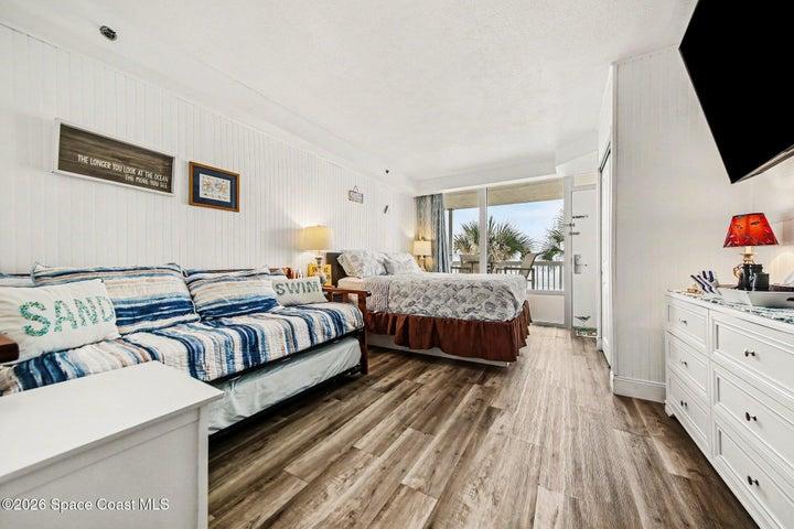 main bedroom with window over looking ocean