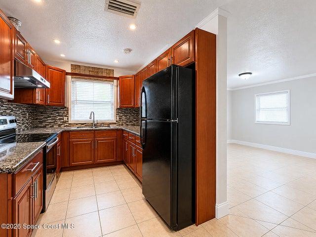 Kitchen View facing living room: Virtually Decluttered
