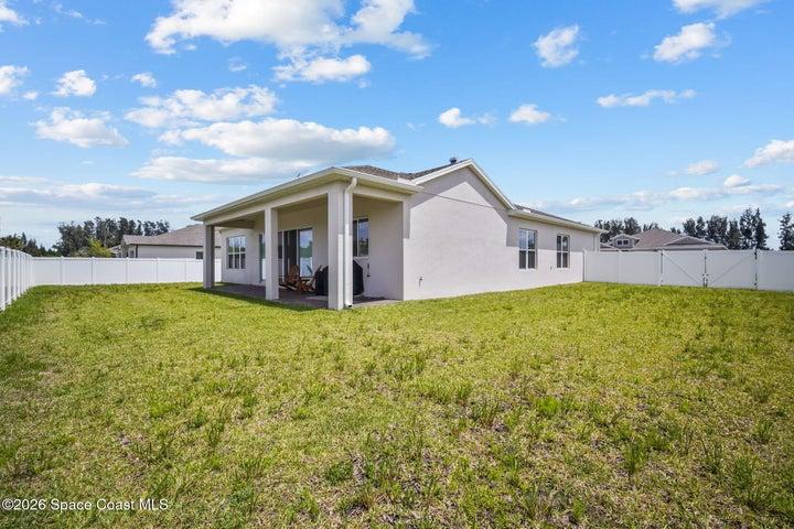 Huge fenced yard with covered porch