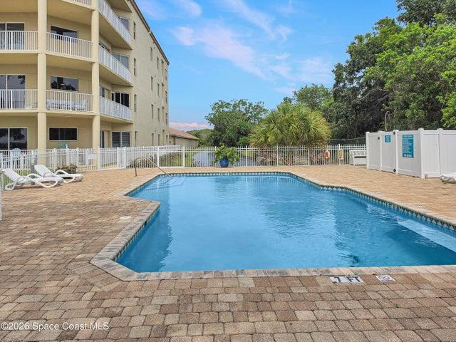 Large pool deck with plenty of seating for sunning and visiting.