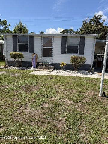 909 Vireo Drive, Barefoot Bay, FL, 32976 photo 2