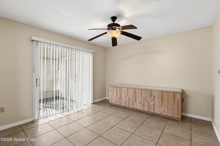 Dining area with sliders leading to the patio.