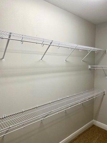 PRIMARY BEDROOM HAS A SPACIOUS WALK-IN CLOSET