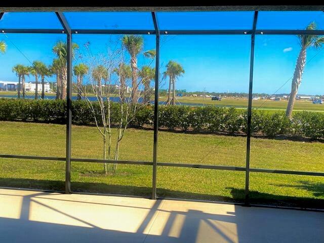 VIEW FROM SCREENED AND COVERED PATIO
