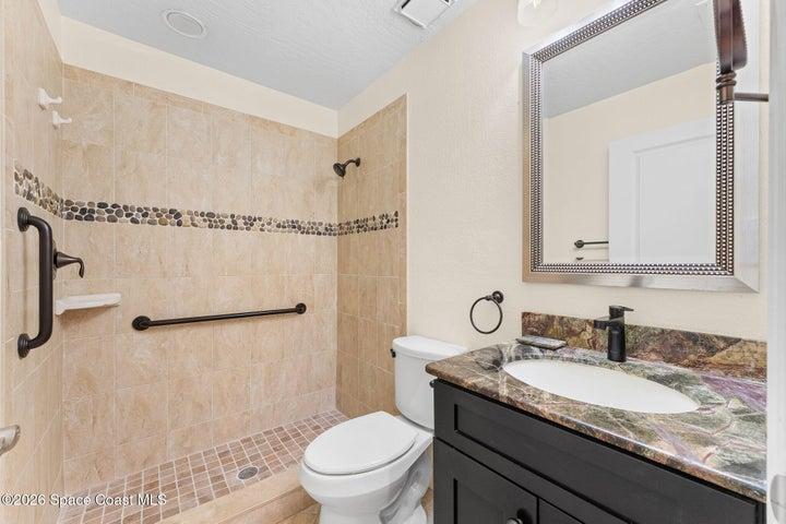 Hall bathroom off the guest bedroom with walk-in shower