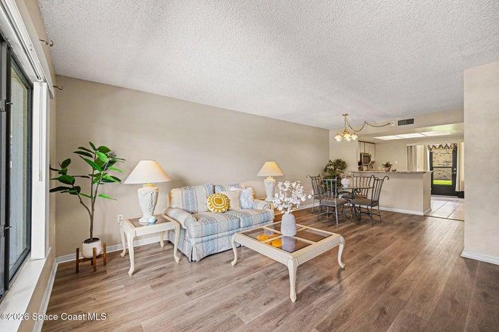 As soon as you walk into the ground floor unit, the condo basks in plenty of natural light and has an open floor plan.