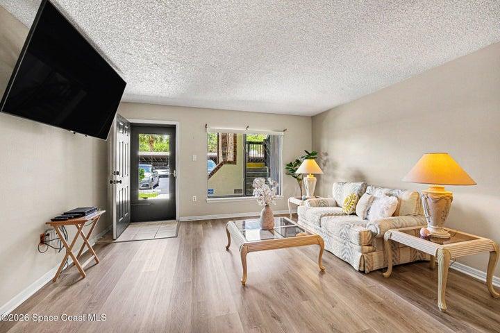 Floors have been updated in luxury vinyl wood throughout living room, dining and bedrooms. No carpets!