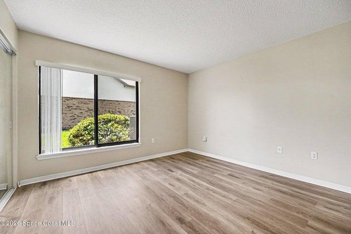 Other angle of primary bedroom