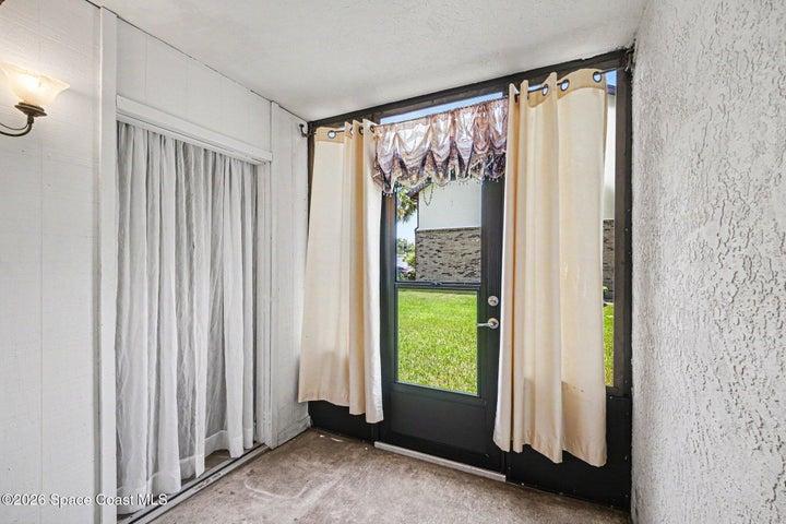 Enclosed back patio with extra storage space,