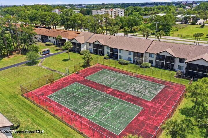 The condo complex also has tennis courts,