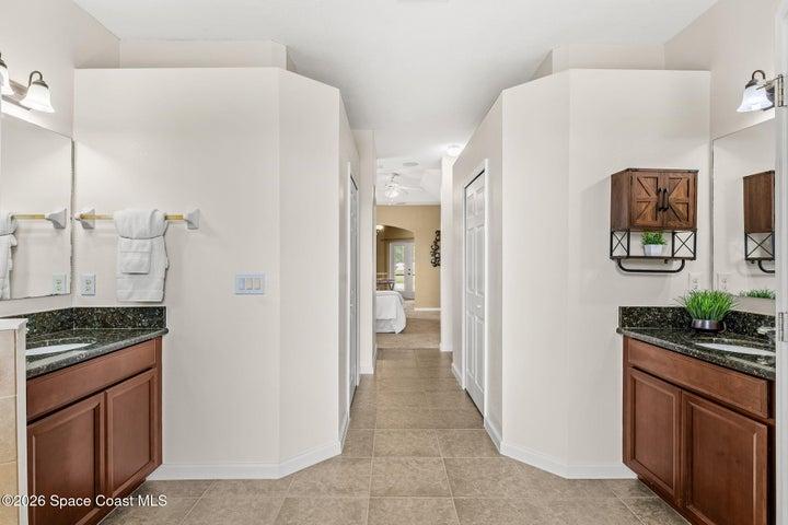 Double vanities in primary bath.
