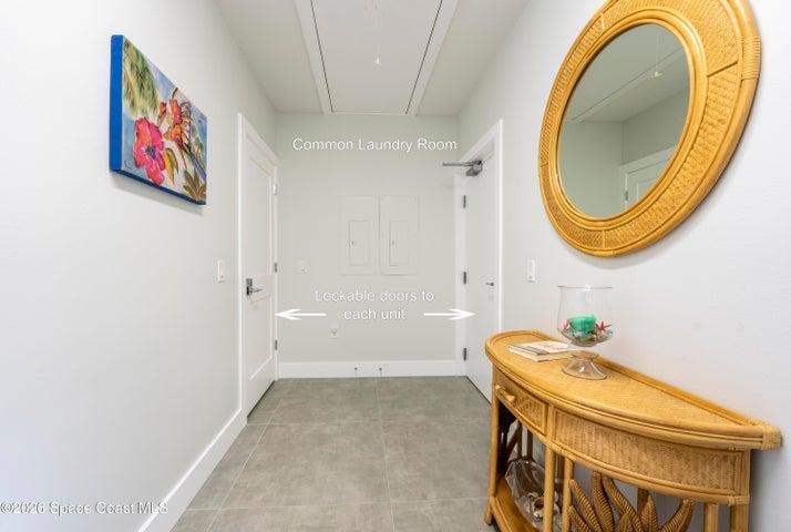 Large indoor laundry - view to East with entry to both units