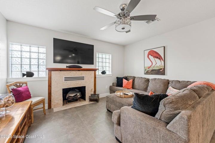 Wood burning fireplace, coralina stone accents the inside and on the chimney