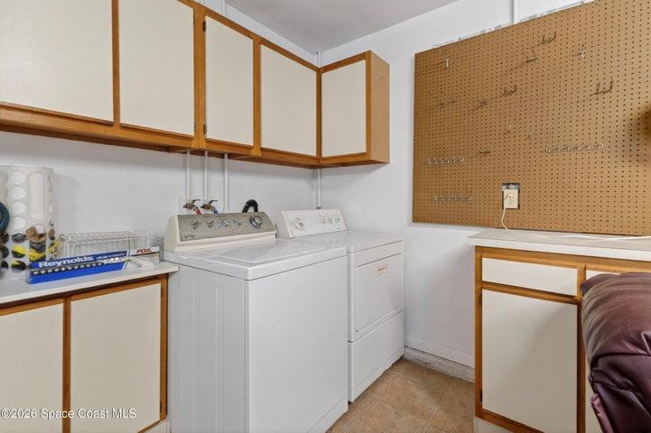 Laundry area in two car garage