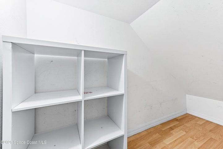 Storage closet under stairs