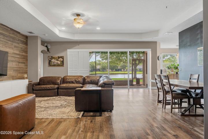 Great Room - notice the triple sliders and plantation shutters!