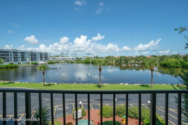 Front walkway view of pond, fountain from 3rd-floor Riverwest condo, Cocoa Beach, Florida