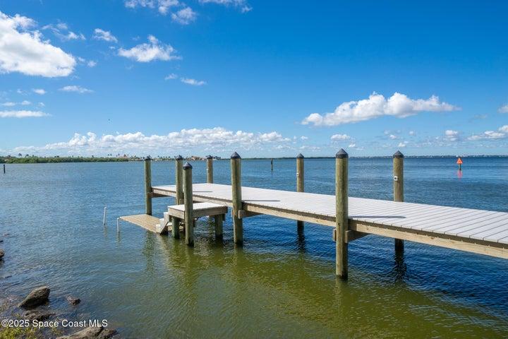 Private dock with steps and pilings on the Banana River, Riverwest, Cocoa Beach