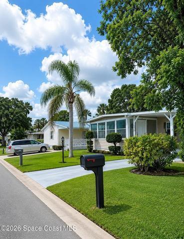 1109 Wren Circle, Barefoot Bay, FL, 32976 photo 2