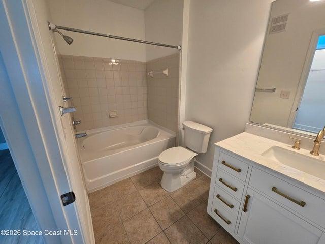 Primary Bathroom with Tub and Shower Combo...Brand New Kohler Toilet...