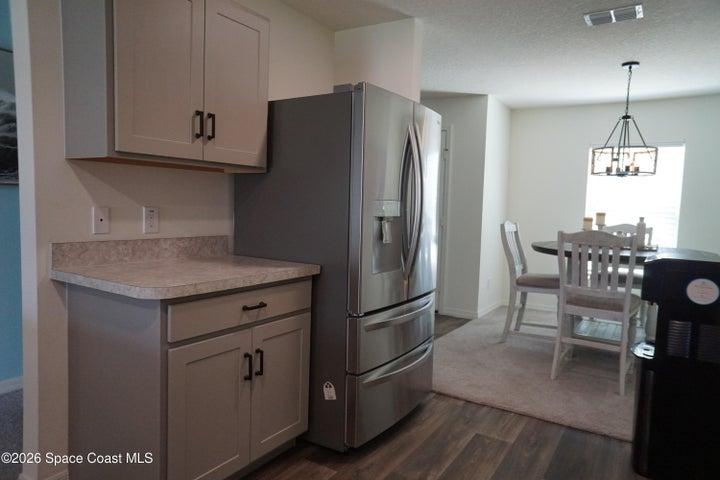 Modern kitchen cabinetry with matte black hardware