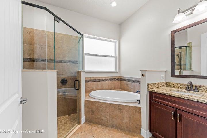 Gorgeous bathroom with tub and separate shower