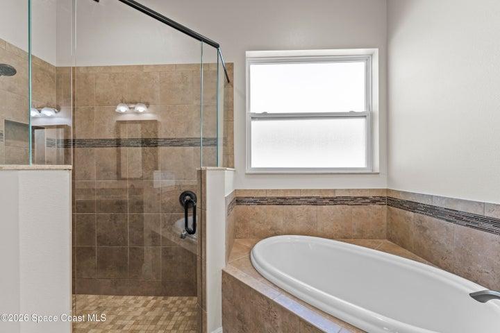 Gorgeous bathroom with tub and separate shower